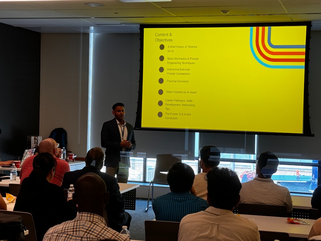 Taj presenting to an audience about AI Content & Objectives